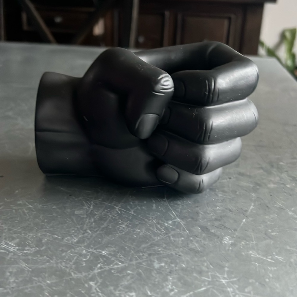 Black hand pencil or makeup brush holder